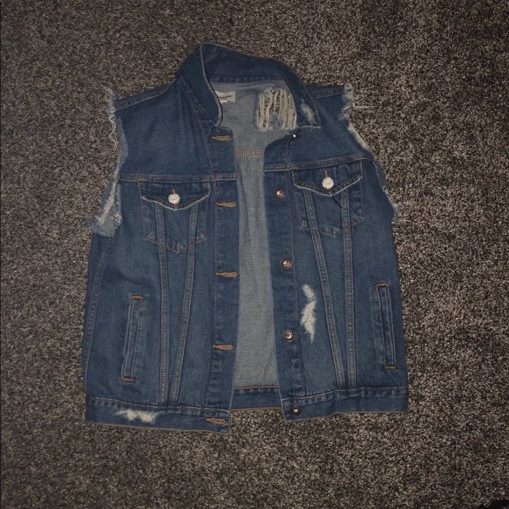 Distressed denim vest